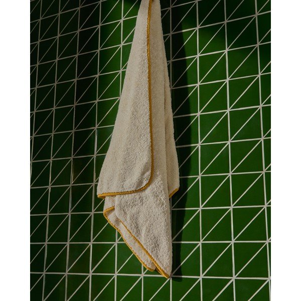 Kollane/valge frotee puuvillane vannirätik 70x140 cm Sedora - Kave Home-image-1