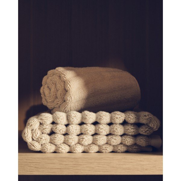 Beež puuvillane froteerätik 70x140 cm Navira - Kave Home-image-1