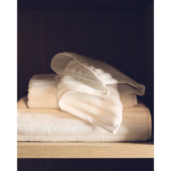 Valge puuvillane froteerätik 70x140 cm Navira - Kave Home-image-1