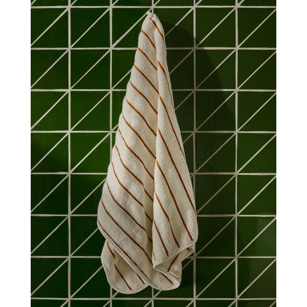 Oranž/beež frotee-puuvillane rätik 50x90 cm Dorane - Kave Home-image-1